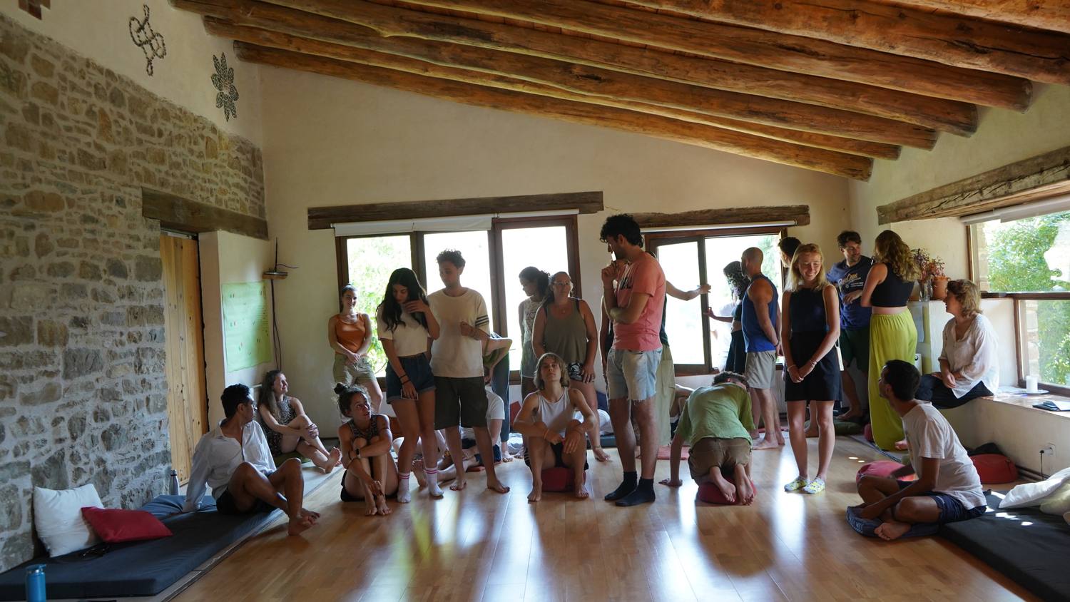 A large circle session inside the training venue